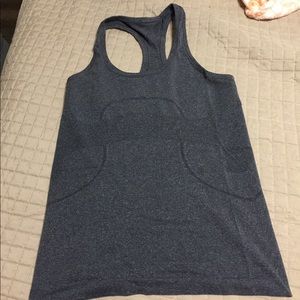 2 Lululemon swiftly Tanks 6